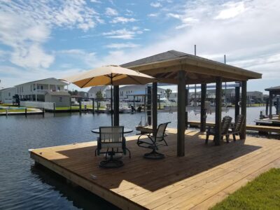 Empty private dock behind waterfront home on the Chesapeake Bay