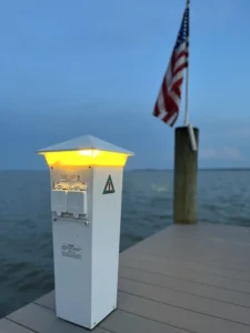 Boat slip power pedestal and residential dock on the Potomac River